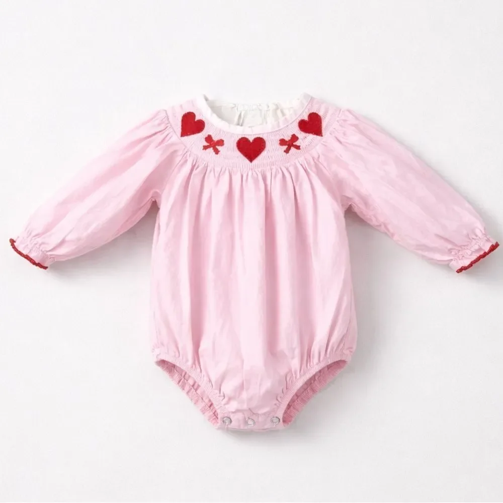 Boutique pink smocked bubble romper with hearts and bows embroidery size 3 month